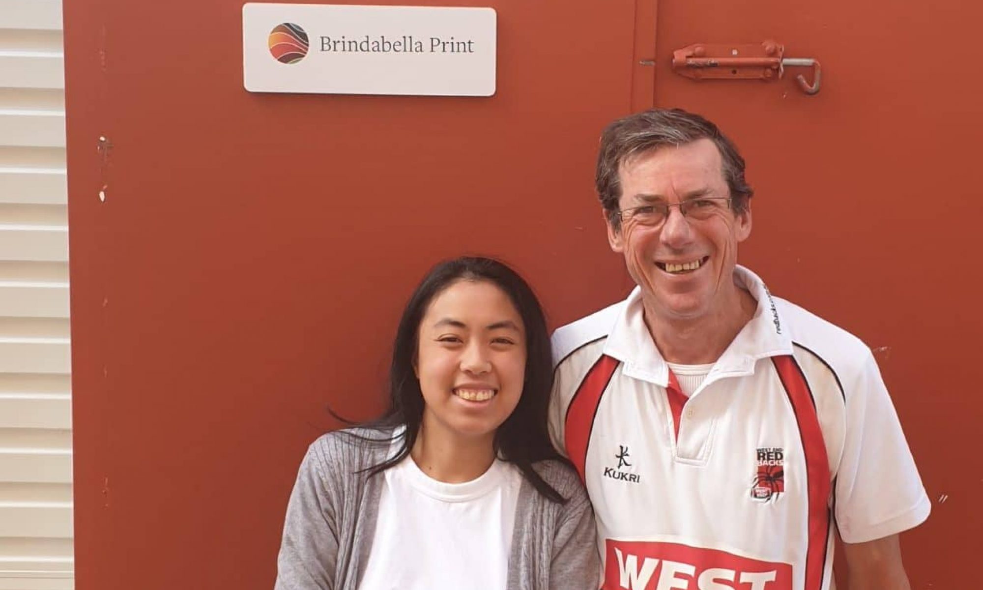 Members of the Brindabella Print Team - Kelsy is on the left while Sean is on the right